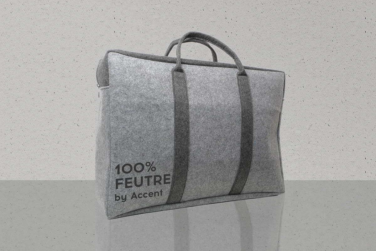 valisette luxe pour couette haut de gamme en feutre gris et poignées contrastantes
